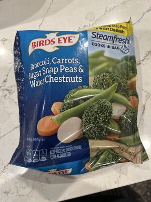 Steam Fresh Broccoli Carrots Sugar Snap Peas And Water Chestnuts